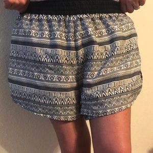 4 for $10!!!  Reversible black and white shorts